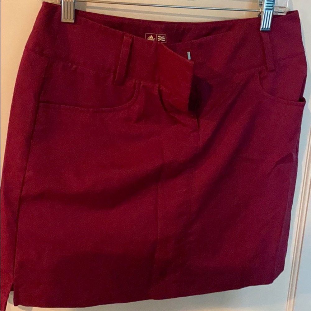 Maroon adidas golf skort